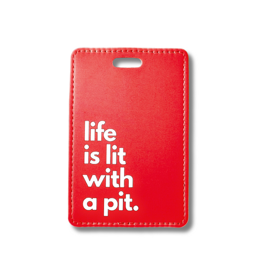 suitcase tag gift for pit bull owner. Red with white words "Life is lit with a pit"