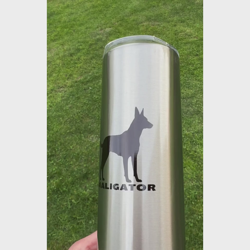 Video: Stainless steel Malinois Maligator Tumbler featuring a black silhouette of a Belgian Malinois.