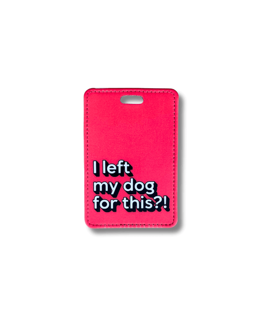 Red funny suitcase tag with "I left my dog for THIS?!" printed in bold white and black text. 