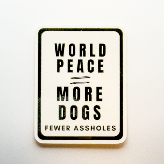 vertical white rectangle sticker "world peace equals more dogs / fewer assholes