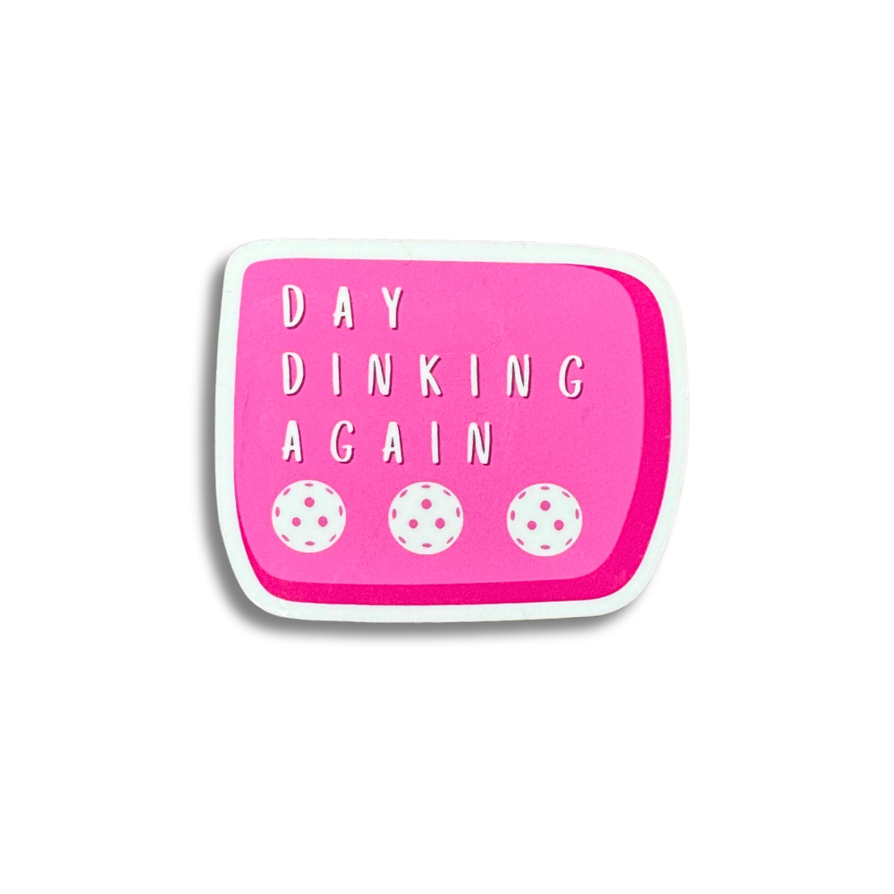 Rectangular vinyl sticker in two shades of pink with three white Pickleballs: Day Dinking Again