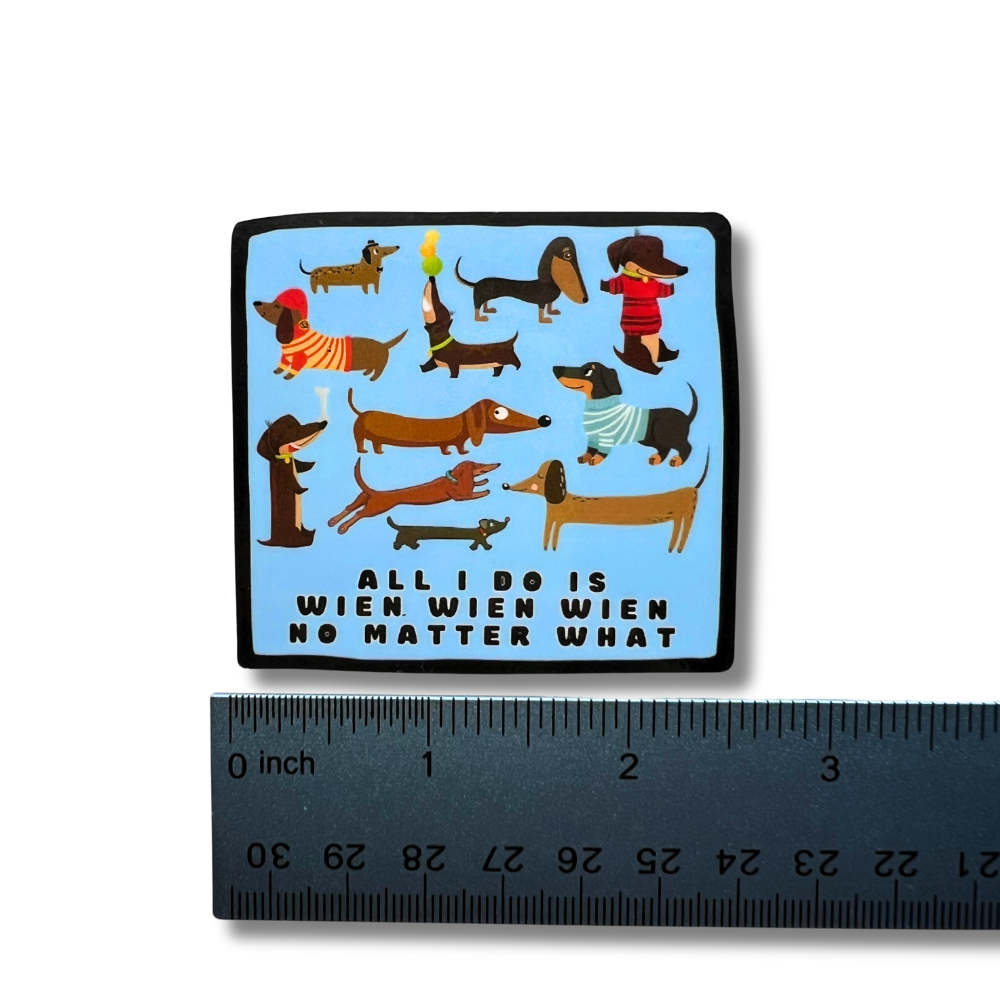 Ruler showing size of dachshund sticker with cute cartoon dachshunds