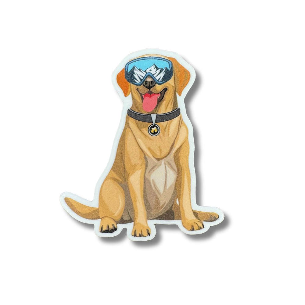 sticker of yellow lab (labrador dog) wearing ski gogles that have a reflection of the mountains in them. His collar tag has beers on it.