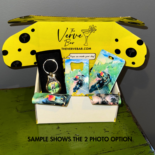 custom dog photo gift box with keychain, lens cloths, luggage tag and bottle opener in branded yellow packaging