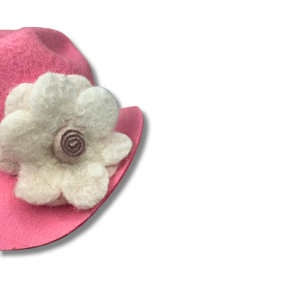 close up of white wool felt flower on the mini pink dog cowboy hat